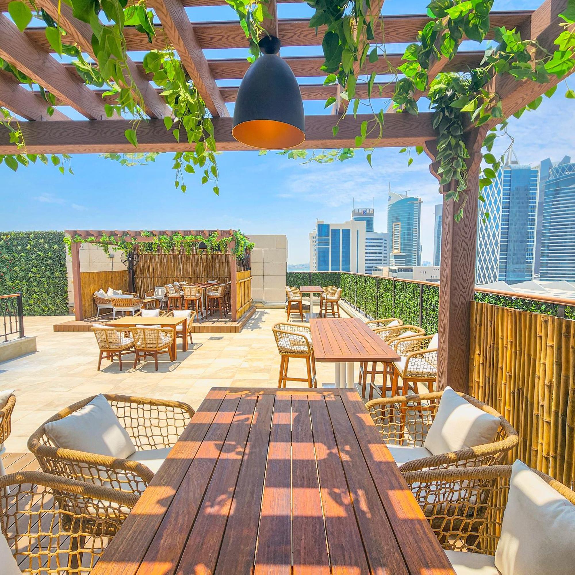 City Centre Rotana Ad-Dauha Zewnętrze zdjęcie The rooftop bar at the hotel
